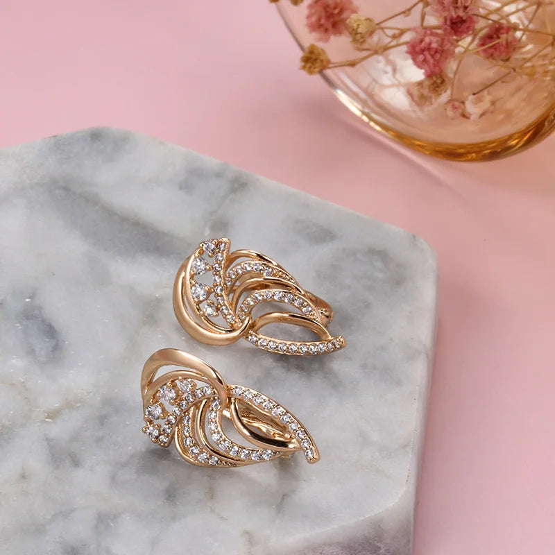 Aretes Tipo Botón de Oro Rosa con Diamante
