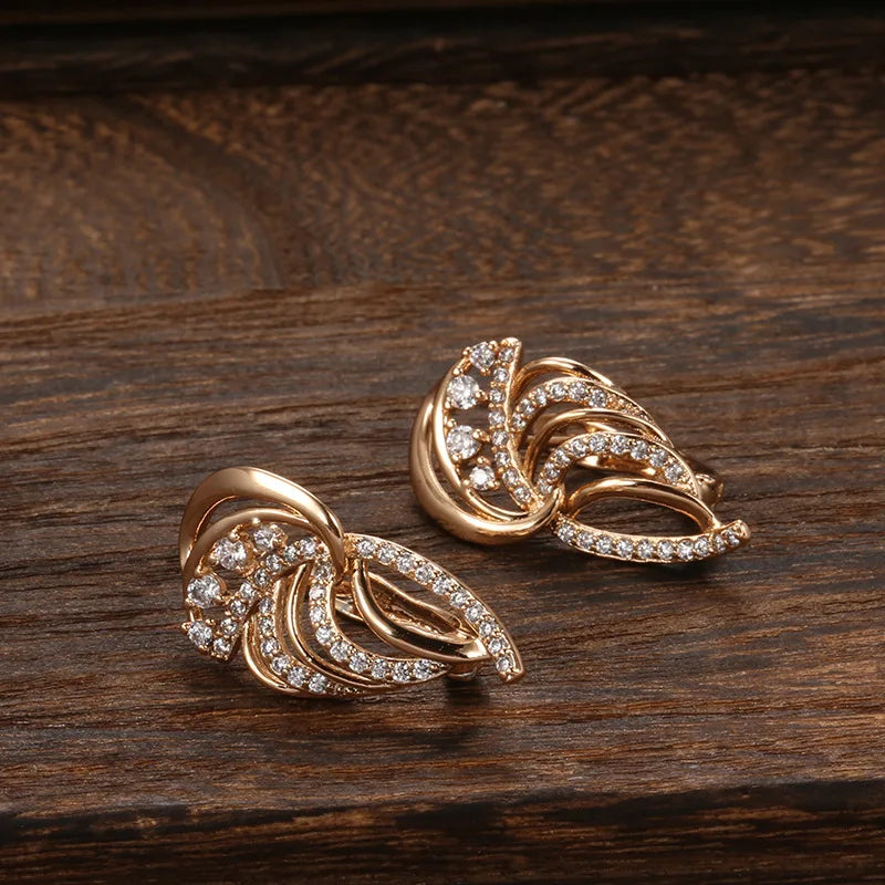 Aretes Tipo Botón de Oro Rosa con Diamante