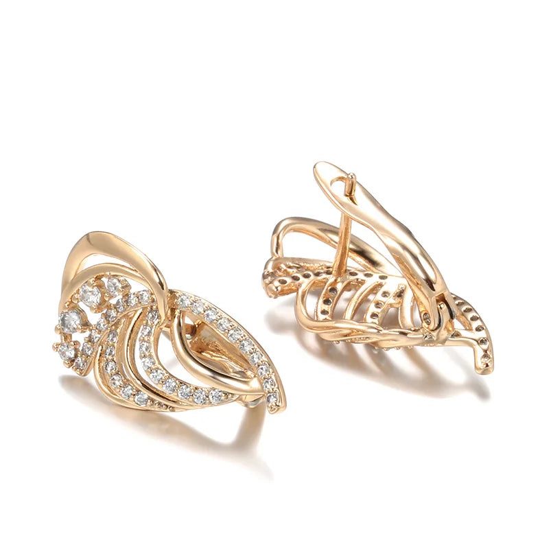 Aretes Tipo Botón de Oro Rosa con Diamante